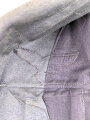 Luftwaffe, blaue Tropenfeldbluse 1. Modell. Kammerstück von 1941. Leicht angeschmutzt, der Brustadler original vernäht, leicht getragenes Stück