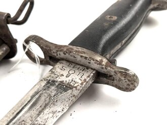 U.S. Army  2.Weltkrieg, Seitengewehr für M 1 Garand . Hersteller UC, datiert 1943. Ungereinigtes Stück, oberer Scheidenbeschlag leicht verbogen