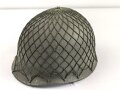 Bundeswehr, Stahlhelm alter Art in gutem Zustand. Das Tarnnetz ist meiner Meinung nach von der NVA.