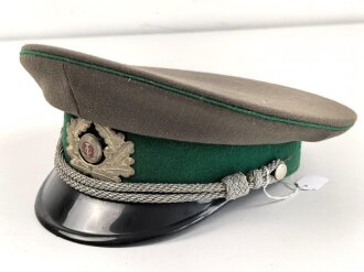 Nationale Volksarmee NVA der DDR, Schirmmütze für einen Offizier der Grenztruppe, Kopfgrösse 57, Hergestellt 1975