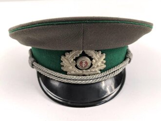 Nationale Volksarmee NVA der DDR, Schirmmütze für einen Offizier der Grenztruppe, Kopfgrösse 57, Hergestellt 1975