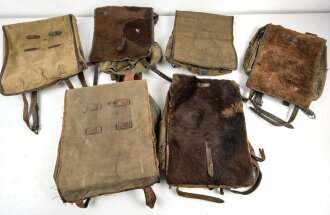 Sechs deutsche Tornister aus der Zeit des 2. Weltkrieg, Wehrmacht und Partei bzw. Eigentumstücke für Parteiverbände. Alles mehr oder weniger defekt