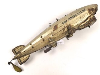 Blechspielzeug, Luftschiff "Graf Zeppelin DLZ 127" Hersteller Tippco. Gesamtlänge 43cm, unvollständig, ungereinigt, ohne Funktion