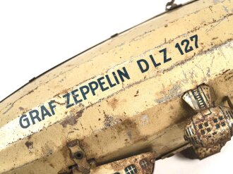 Blechspielzeug, Luftschiff "Graf Zeppelin DLZ 127" Hersteller Tippco. Gesamtlänge 43cm, unvollständig, ungereinigt, ohne Funktion