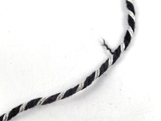 Schwarz-silberne Kordel / Litze. Durchmesser etwa 2,5mm, Gesamtlänge 50cm, UV Negativ