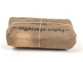 Verbandpäckchen Wehrmacht für den Verbandkasten und die Verbandspäckchentasche der Feldbluse. Kleines Modell datiert 1937