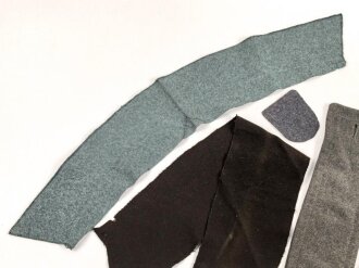 Konvolut Uniformstoff, das Stück Heerestsoff mit den beiden Knopflöchern in den Maßen 8,5 x 30cm