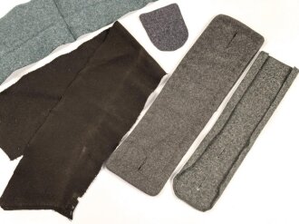 Konvolut Uniformstoff, das Stück Heerestsoff mit den beiden Knopflöchern in den Maßen 8,5 x 30cm