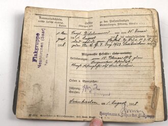 Preußen, Militärpaß eines Angehörigen im Artillerie Regiment 97 , in Krieg zur Maschinen Gewehr Kompanie 137 versetzt. Ostfeldzug ( Lettland) Eisernes Kreuz 2. Klasse 1915. Flakgruppe Neunkirchen Saar 1918