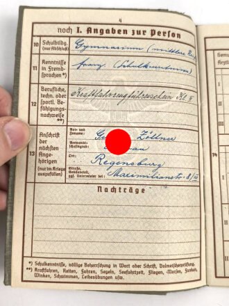 Wehrpaß Luftwaffe, eingestellt am 1.4.1940 bei Fliegerhorstkompanie Regensburg.