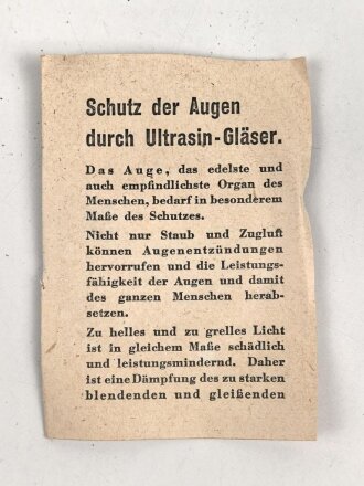 Allgemeine Schutzbrille Wehrmacht in Hülle aus Ersatzmaterial. Umbral Gläser ( getönt) , mit beiliegendem Hinweiszettel, dieser mit Druckvermerk von 1942