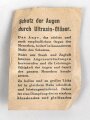 Allgemeine Schutzbrille Wehrmacht in Hülle aus Ersatzmaterial. Umbral Gläser ( getönt) , mit beiliegendem Hinweiszettel, dieser mit Druckvermerk von 1942