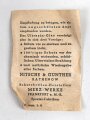 Allgemeine Schutzbrille Wehrmacht in Hülle aus Ersatzmaterial. Umbral Gläser ( getönt) , mit beiliegendem Hinweiszettel, dieser mit Druckvermerk von 1942