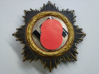 Deutsches Kreuz in Gold, Hersteller "20" Zimmermann Pforzheim, getragenes Stück, die Emaille unbeschädigt