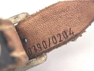 Stahlhelm Kinnriemen Wehrmacht, neuzeitliche Fertigung. Ungereinigt