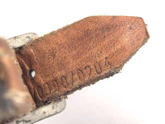 Stahlhelm Kinnriemen Wehrmacht, neuzeitliche Fertigung. Ungereinigt