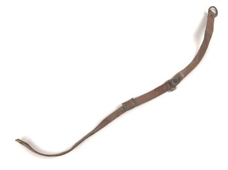 Kinnriemen für einen Tropenhelm der Wehrmacht.  Gesamtlänge wie fotografiert 44cm. Ungereinigt, Leder zum Teil trocken