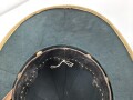 Afrikakorps, Tropenhelm für Angehörige der Luftwaffe. Ursprünglich französischer Helm von 1939, als Beutestück in die Wehrmacht übernommen. Guter Gesamtzustand, die Effekten original ? Kopfgrösse 57