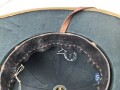 Afrikakorps, Tropenhelm für Angehörige der Luftwaffe. Ursprünglich französischer Helm von 1939, als Beutestück in die Wehrmacht übernommen. Guter Gesamtzustand, die Effekten original ? Kopfgrösse 57