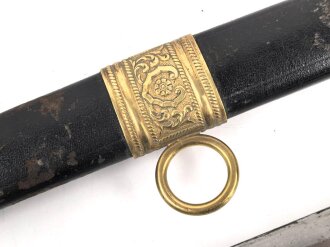 Österreich Ungarn k.u.k. Säbel für Staatsbeamte Modell 1889. Griffwickung fehlt, Klinge von Weyersberg Solingen leicht fleckig.