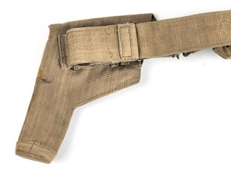 British 1940 dated three piece construction web belt, with pistol holster and ammo pouch. Buckles for braces removed, good condition