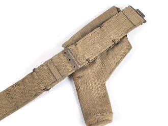 British 1940 dated three piece construction web belt, with pistol holster and ammo pouch. Buckles for braces removed, good condition