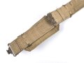 British 1940 dated three piece construction web belt, with pistol holster and ammo pouch. Buckles for braces removed, good condition
