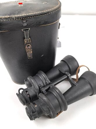 Kriegsmarine, Doppelfernrohr DF 7 x 50 , Hersteller beh. Sehr guter Zustand, die Gummiarmierung weich, Durchsicht leicht verunreinigt. Der Behälter aus Ersatzmaterial in gutem Zustand