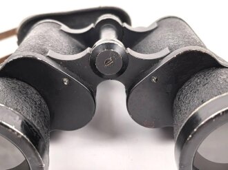 Kriegsmarine, Dienstglas 7 x 50 mit speziellen Okularmuscheln , Hersteller bmk. Glasklare Durchsicht, keine Strichplatte. Okularabdeckung weich. Trageriemen mit Altersspuren.