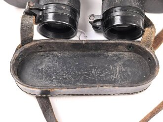 Kriegsmarine, Dienstglas 7 x 50 mit speziellen Okularmuscheln , Hersteller bmk. Glasklare Durchsicht, keine Strichplatte. Okularabdeckung weich. Trageriemen mit Altersspuren.