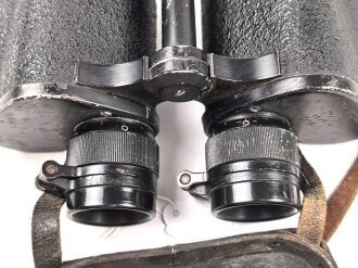 Kriegsmarine, Dienstglas 7 x 50 mit speziellen Okularmuscheln , Hersteller bmk. Glasklare Durchsicht, keine Strichplatte. Okularabdeckung weich. Trageriemen mit Altersspuren.