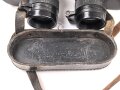 Kriegsmarine, Dienstglas 7 x 50 mit speziellen Okularmuscheln , Hersteller bmk. Glasklare Durchsicht, keine Strichplatte. Okularabdeckung weich. Trageriemen mit Altersspuren.