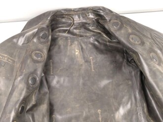 Schwerer Gasschutzanzug , Jacke und Hose aus weichem Gummi, Hersteller Continental. Ein Hosenträger fehlt, sonst guter Zustand