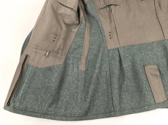 Feldbluse Modell 1936 für einen Angehörigen des Heeres. Ungetragenes Kammerstück von 1939, Brustadler und Kragenspiegel original vernäht, Im Bereich der linken Brust einige kleine Löcher , sonst einwandfrei