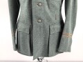 Feldbluse Modell 1936 für einen Angehörigen des Heeres. Ungetragenes Kammerstück von 1939, Brustadler und Kragenspiegel original vernäht, Im Bereich der linken Brust einige kleine Löcher , sonst einwandfrei