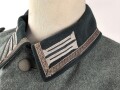 Feldbluse Modell 1936 für einen Angehörigen des Heeres. Ungetragenes Kammerstück von 1939, Brustadler und Kragenspiegel original vernäht, Im Bereich der linken Brust einige kleine Löcher , sonst einwandfrei