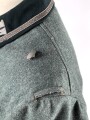 Feldbluse Modell 1936 für einen Angehörigen des Heeres. Ungetragenes Kammerstück von 1939, Brustadler und Kragenspiegel original vernäht, Im Bereich der linken Brust einige kleine Löcher , sonst einwandfrei