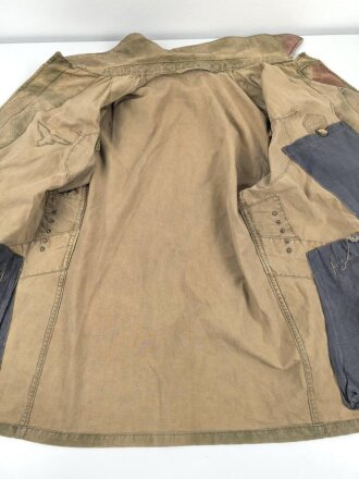 Luftwaffe, Tarnfeldbluse für Angehörige der Felddivision. Getragenes Stück, der Brustadler original vernäht.