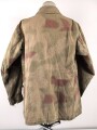 Luftwaffe, Tarnfeldbluse für Angehörige der Felddivision. Getragenes Stück, der Brustadler original vernäht.