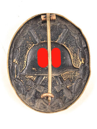 Verwundetenabzeichen schwarz, getragenes Buntmetallstück