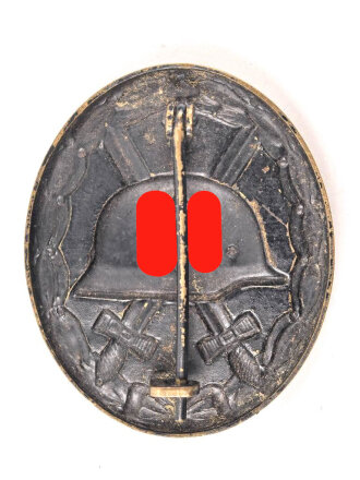 Verwundetenabzeichen schwarz, getragenes Buntmetallstück