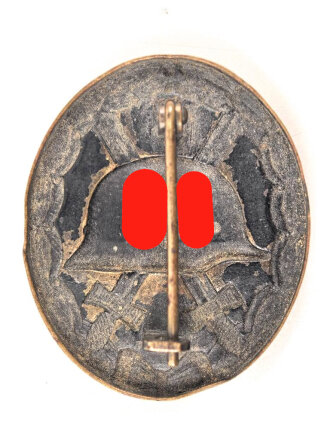 Verwundetenabzeichen schwarz, getragenes Buntmetallstück
