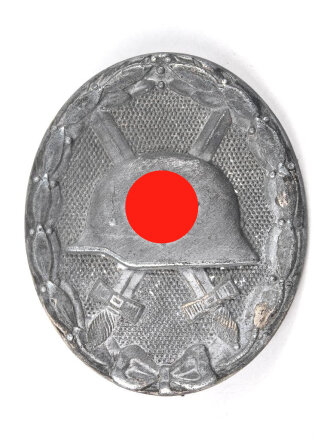 Verwundetenabzeichen silber, Zink, Hersteller "4" auf der Nadel und "L/16" unter dem Gegenhaken für Steinhauer & Lück