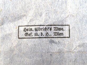 Tüte zum Ehrenkreuz der Deutschen Mutter Zweite Stufe ( silber )  Hersteller Ulbrichts Witwe Wien, Klebereste