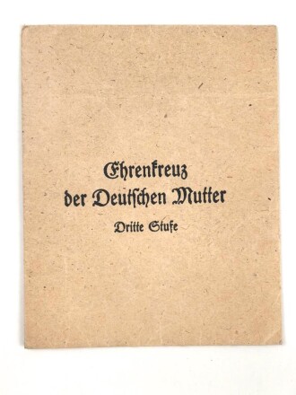 Tüte zum Ehrenkreuz der Deutschen Mutter Dritte Stufe ( bronze )  Hersteller Karl Hensler Pforzheim