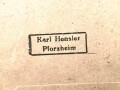 Tüte zum Ehrenkreuz der Deutschen Mutter Dritte Stufe ( bronze )  Hersteller Karl Hensler Pforzheim