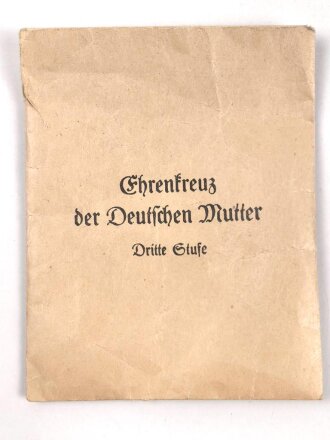 Ehrenkreuz der Deutschen Mutter in bronze an langem Band, in Tüte von Carl Blaschet Wien