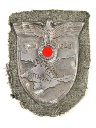 Krimschild 1941/42 , Zink mit resten der  bronzierung. Getragenes Stück