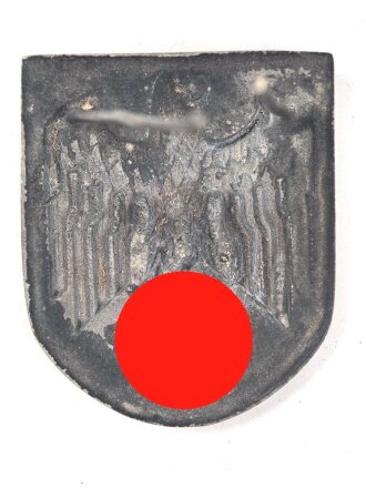 Adlerschild für den Tropenhelm des Heeres. Zink