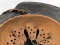 Heer, Stahlhelm Modell 1942. In allen Teilen original , das Innenfutter vermutlich in der Zeit gewechselt, früher Kinnriemen ergänzt, das Hakenkreuz vollständig erhalten. Hersteller EF 64. Ungereinigt